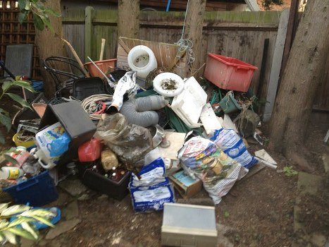 Before and after garden clearance in Kilburn