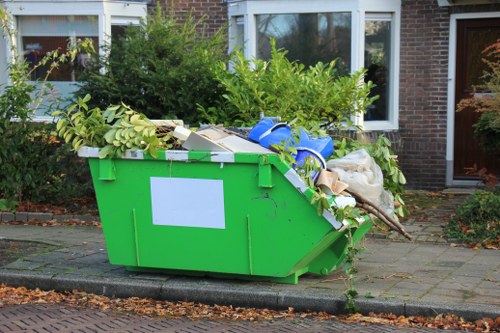 Team clearing overgrown garden in Kilburn